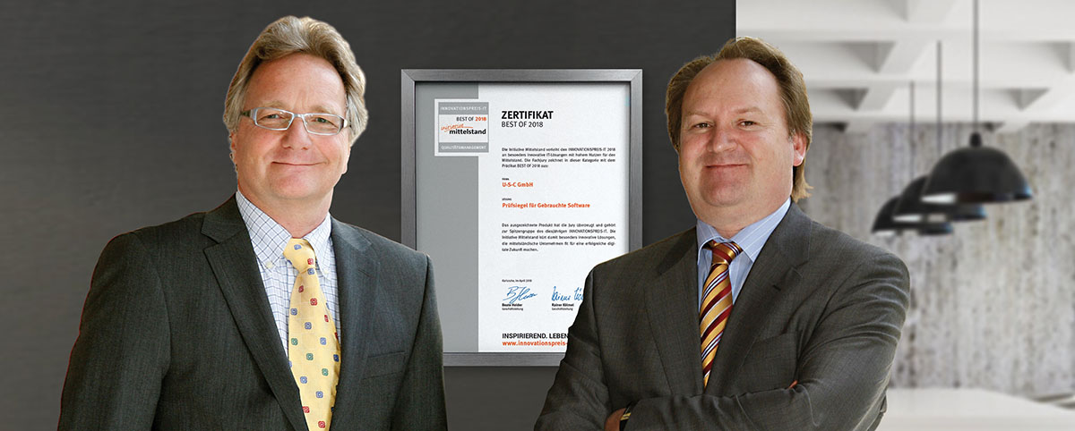 Peter Reiner und Walter Lang, Geschäftsführer der U-S-C GmbH, freuen sich über das „Zertifikat für Best of 2018 Qualitätsmanagement“ Prüfsiegel für Gebrauchte Software